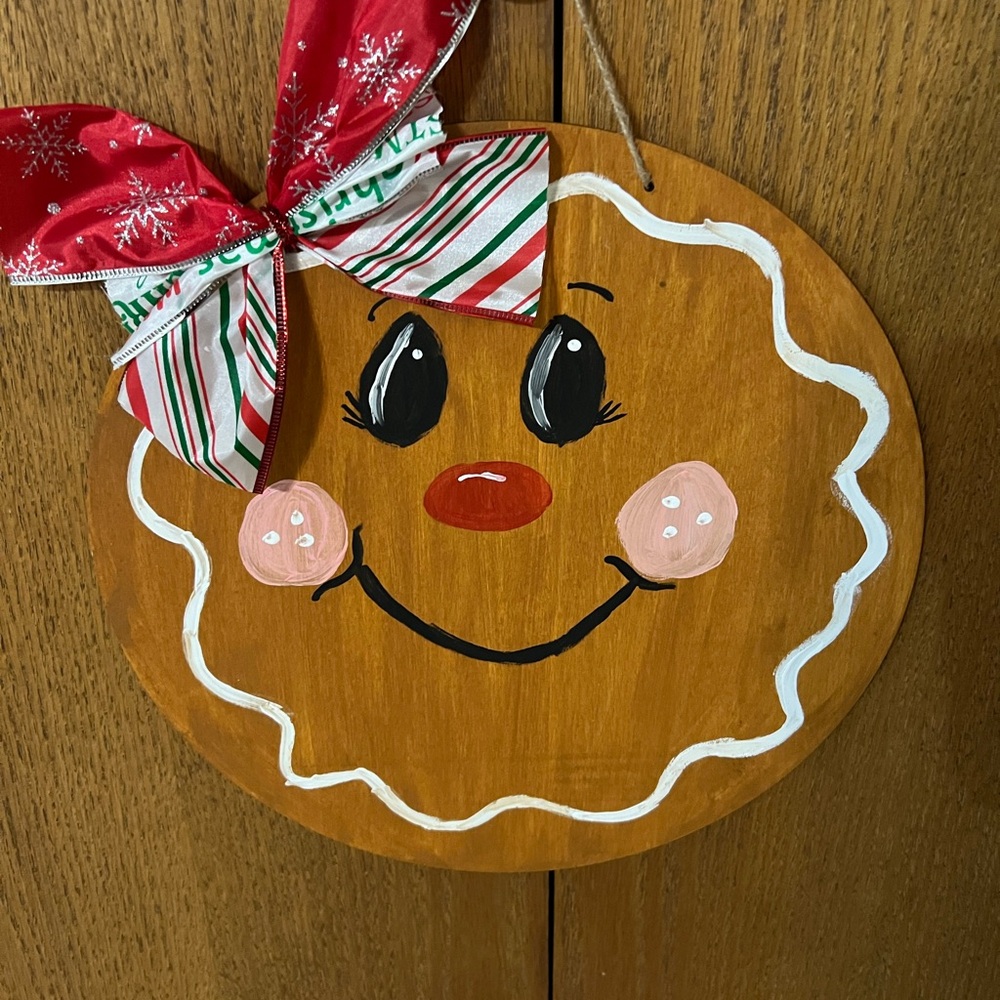 Festive Gingerbread Wall Decor with Red Bow
